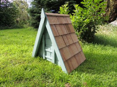 Triangular poultry ark with cedar shingle roof
